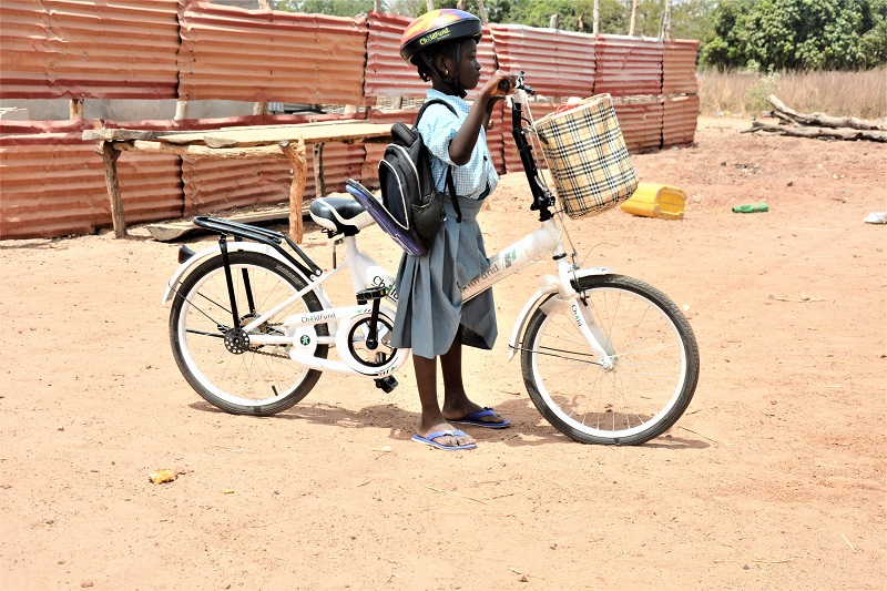 Young girl riding a bike