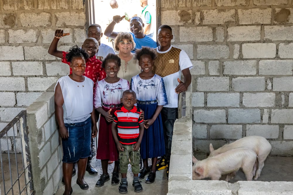 Sponsor Ellen Bell visits her sponsored child Emmanuel and his family. 
