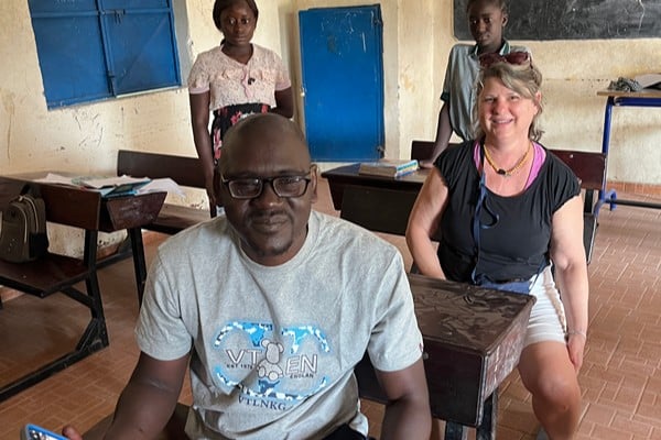 20 years after Deb made the decision to sponsor Momodou in The Gambia, he showed up at her doorstep to say thank you. This year, she returned the favor.