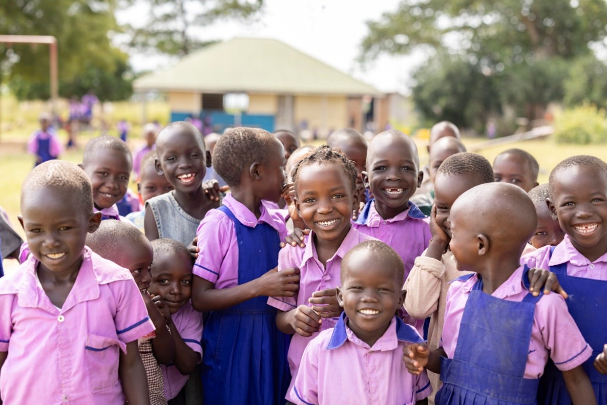 All smiles at a ChildFund-supported early childhood development center in Katakwi District.