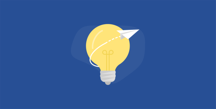 Light bulb with paper airplane flying around it